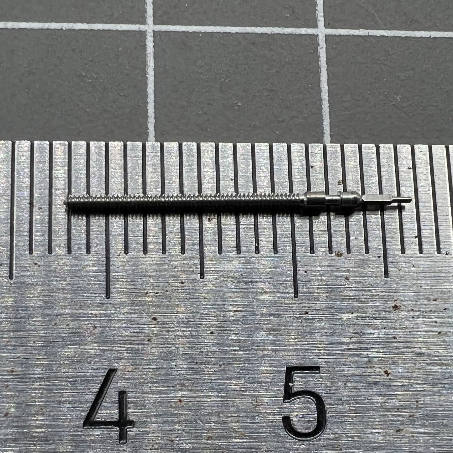 Precision watch winding stem compatible with Miyota 2115 and 2105 movements for reliable repairs.