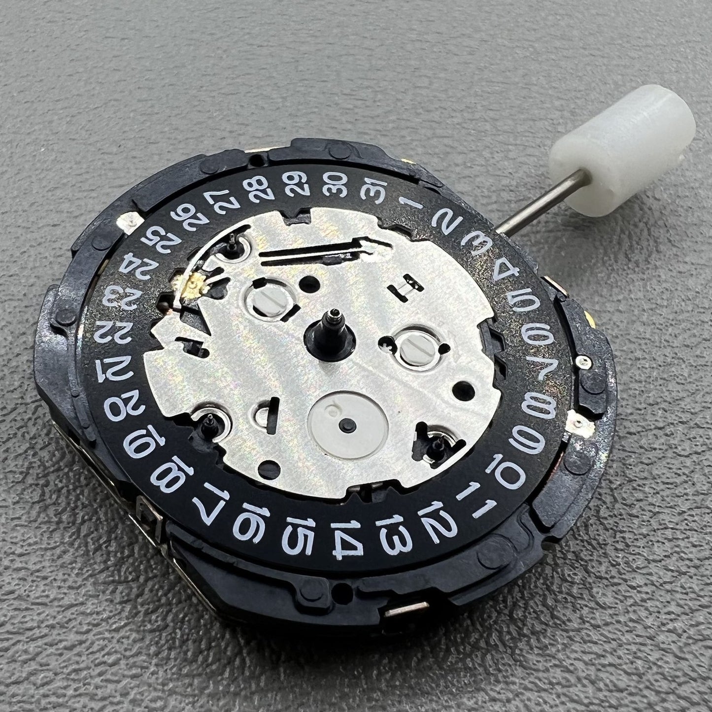 Seiko 7T85A quartz watch movement from Japan, precise and reliable mechanism for watches.
