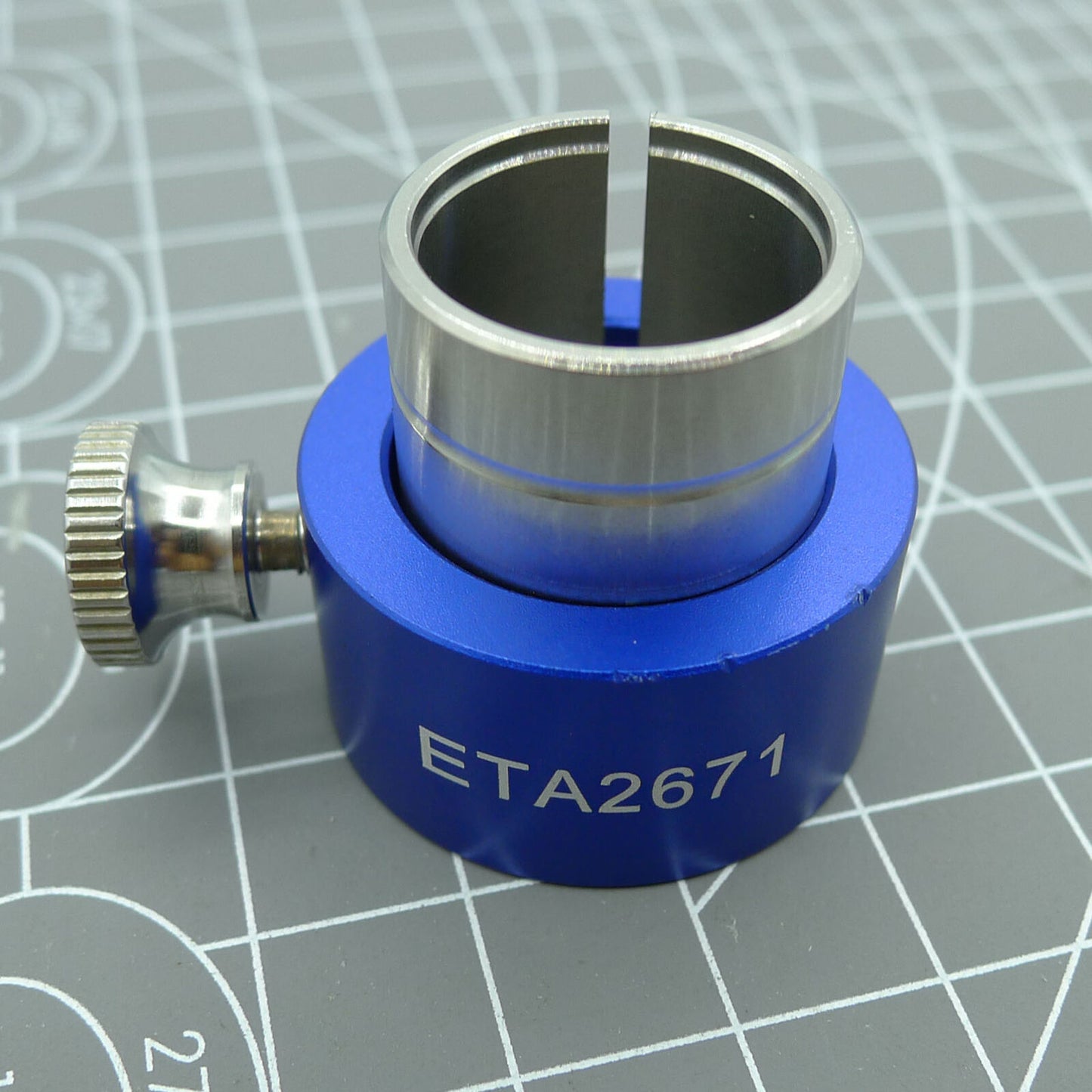 Reversible Movement Holder with Knob for ETA 2671, precise watch repair accessory.