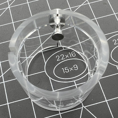 Transparent watch movement holder for RLX3135, secure and precise accessory.