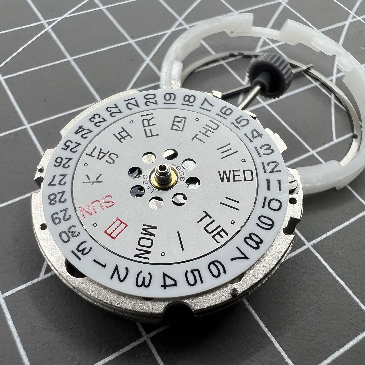 Miyota Citizen 8200 automatic watch movement showcasing double calendar and precise mechanical design.