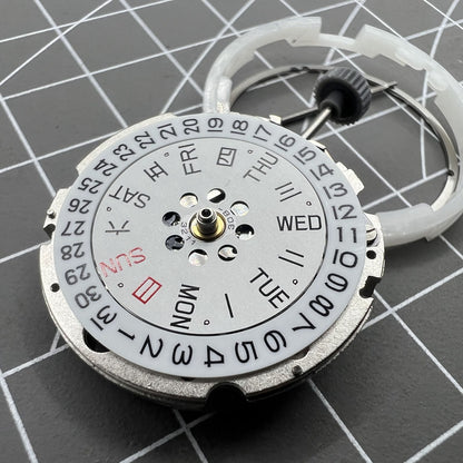 Miyota Citizen 8200 automatic watch movement showcasing double calendar and precise mechanical design.