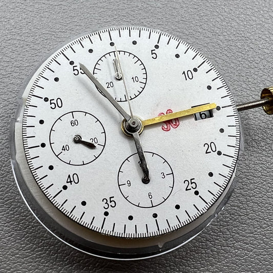 Dandong 7750 mechanical watch movement with single calendar and small second subdials at 6, 9, and 12 o'clock positions
