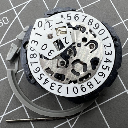 Epson YM04A quartz watch movement with big date, precise timekeeping for quality watch repairs.