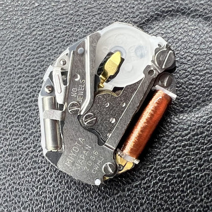 Miyota Citizen 2036 quartz watch movement with stem, ideal for precise watch repair and replacement tasks.