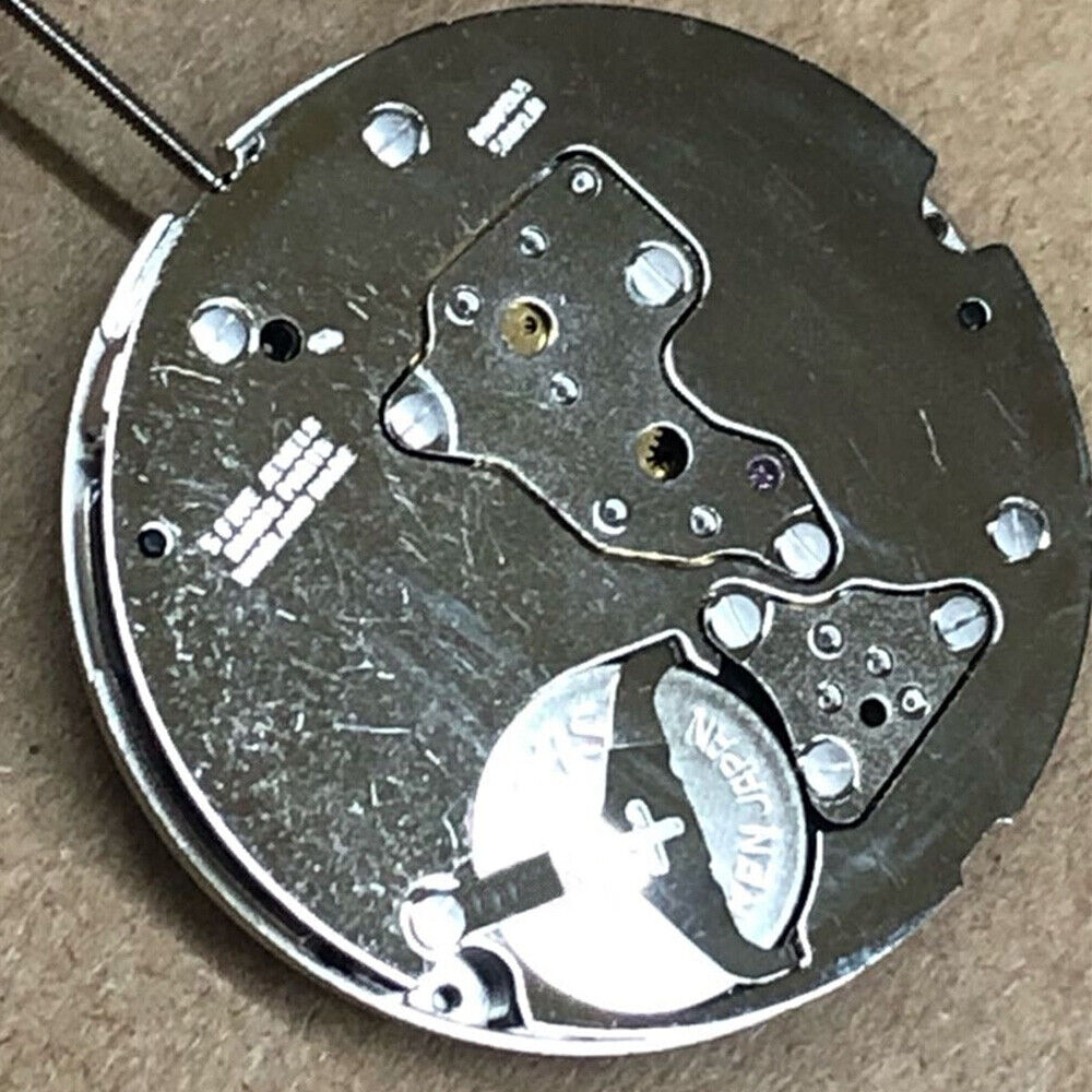Swiss Part Ronda 5021.D watch movement with 5 hands, black date wheel at 6 o'clock, precise timekeeping.