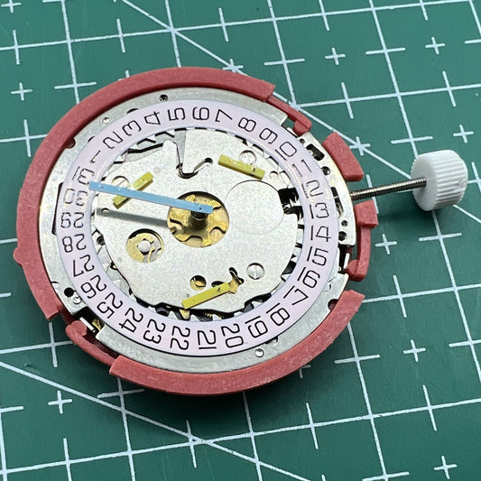 Wholesale Swiss ISA 8181 quartz watch movement with single calendar and multifunction features for precision timekeeping.