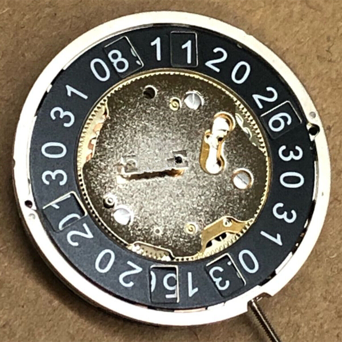 Ronda 4120B quartz watch movement with black disk wheel, precision Swiss watch part for accessories.