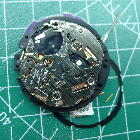 Hattori Epson TMI VS75B solar-powered quartz watch movement, precision Japanese craftsmanship.