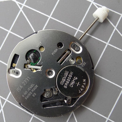Swiss ISA 2331 watch part with black dial, quartz movement, and date display at 6 o'clock for accurate timekeeping.