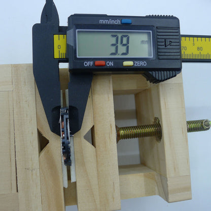 Japan Made VR32B quartz watch movement showcasing multifunctional features on a black dial for precise timekeeping.