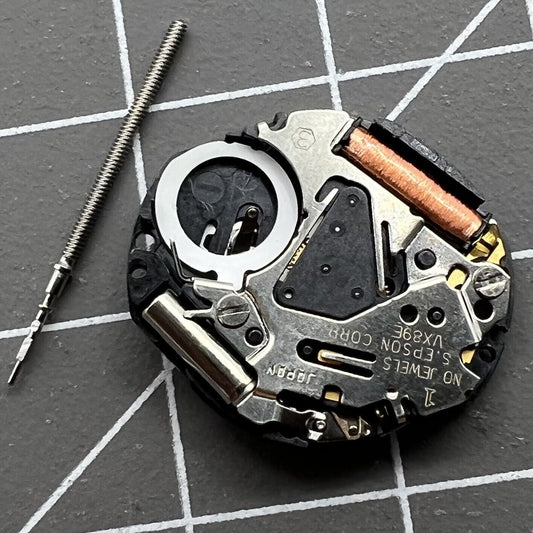 Hattori Epson VX89E quartz watch movement with date at 6 o'clock, precision timekeeping part.