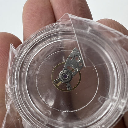 Japan Made Silver complete balance wheel with splint for Miyota 8N24 watch movement, precision component.