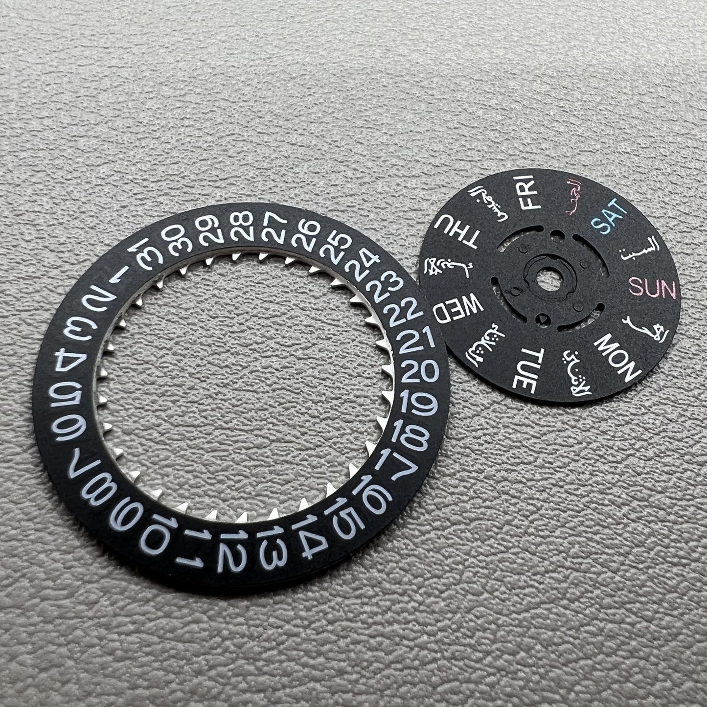 Black Arabic and English date and week wheel for NH36 movement, crown at 3 o'clock, precision watch part by NH36.