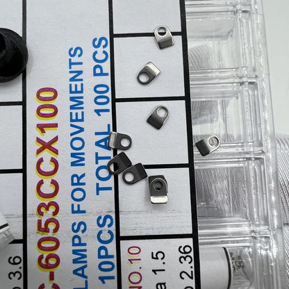 Precision fit casing clamps for watch movements, 10 sizes, 100pcs box, ideal for watch repair.