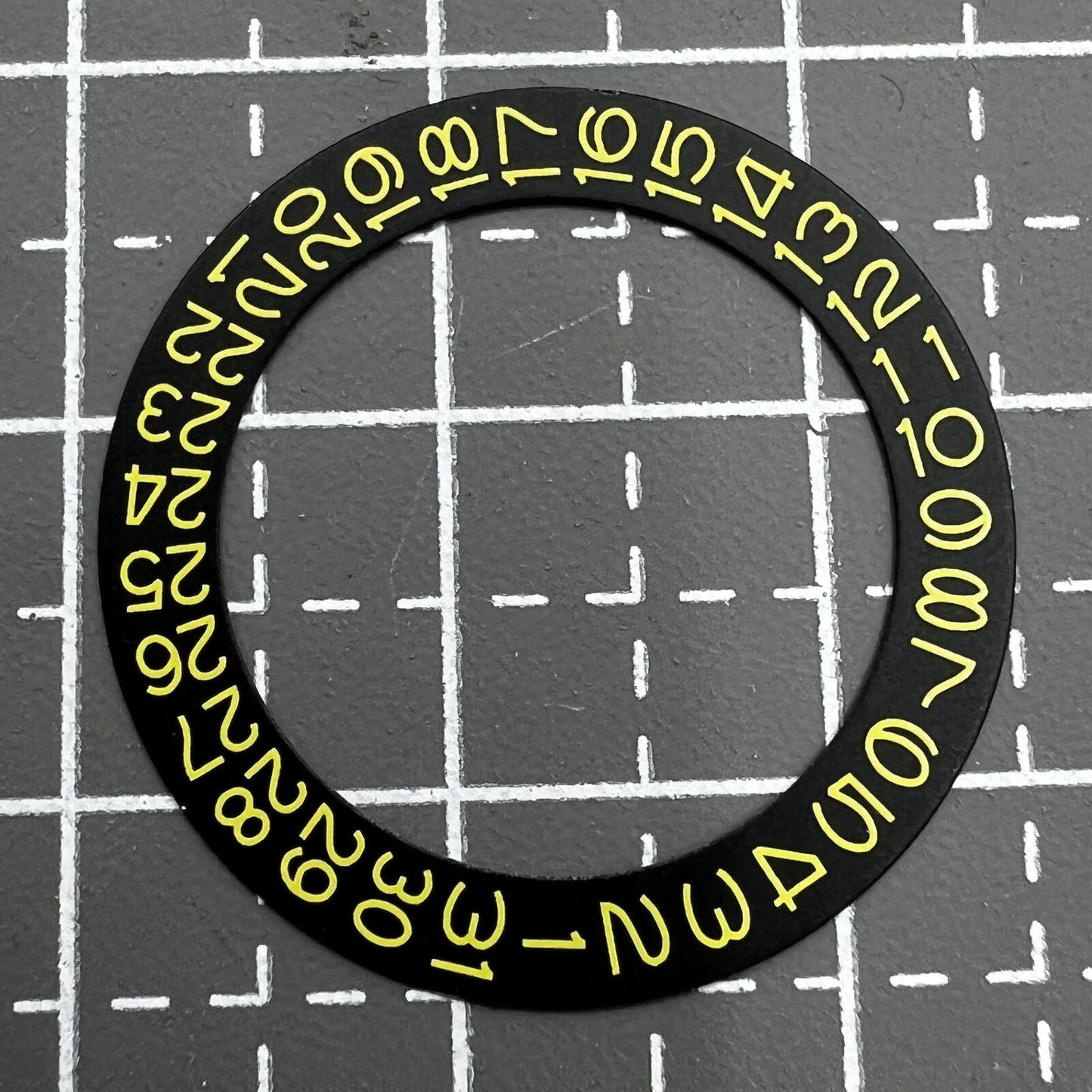 Yellow date wheel with black numbers for NH35 NH36 watch movement, enhancing dial readability.