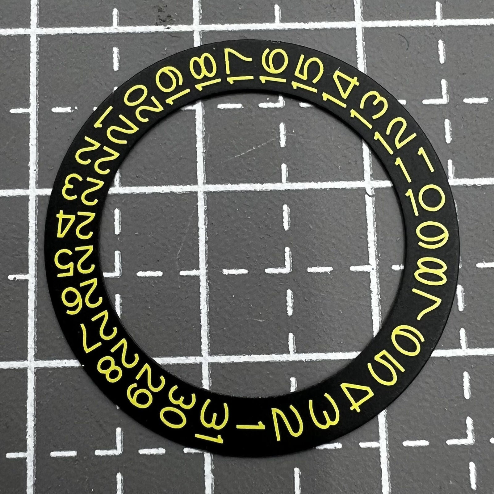 Yellow date wheel with black numbers for NH35 NH36 watch movement, enhancing dial readability.