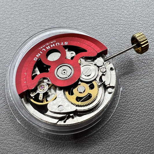 Hollow Hangzhou 2189 watch accessory showing automatic mechanical movement with red rotor and three hands.