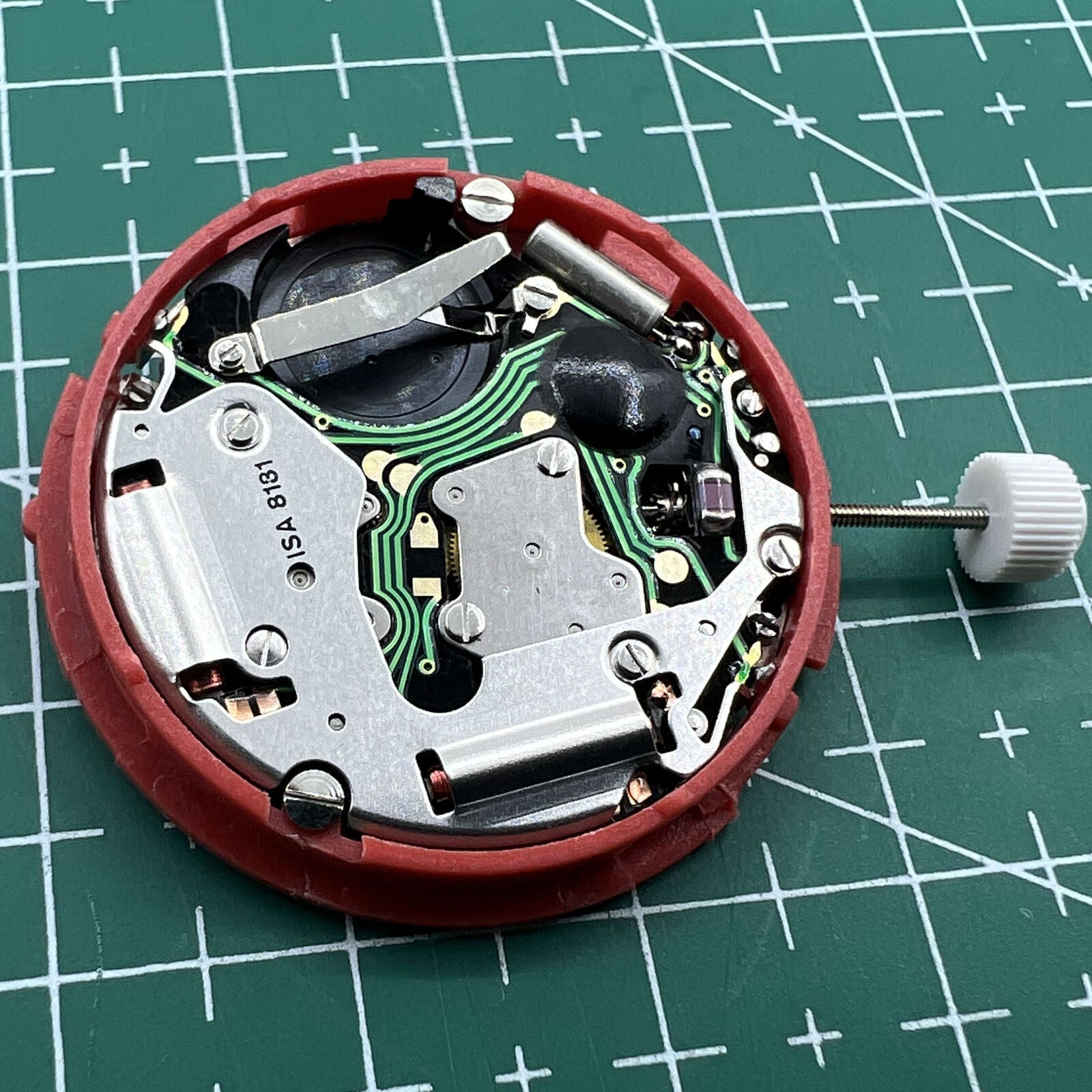 Swiss ISA 8181 quartz watch movement with single calendar and multifunction, ideal for precise watch repair and assembly.