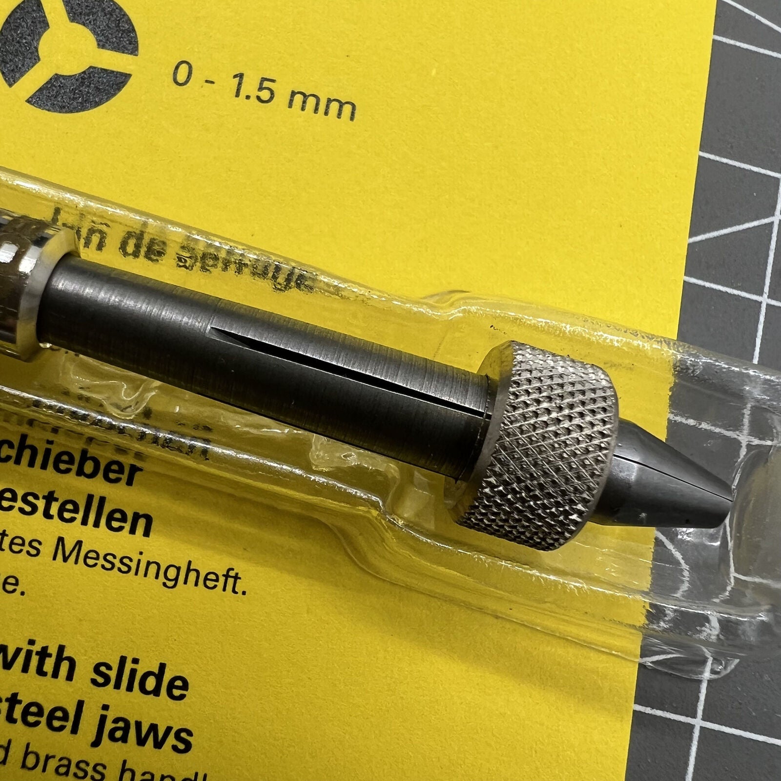 Bergeon 30432 pin vice with slide lock holds drills and broaches securely for precise watch repairs.