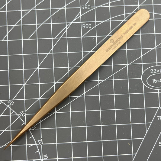 SWISS MADE Bergeon 7421-PM-S5 bronze tweezers for precise watch accessory handling.