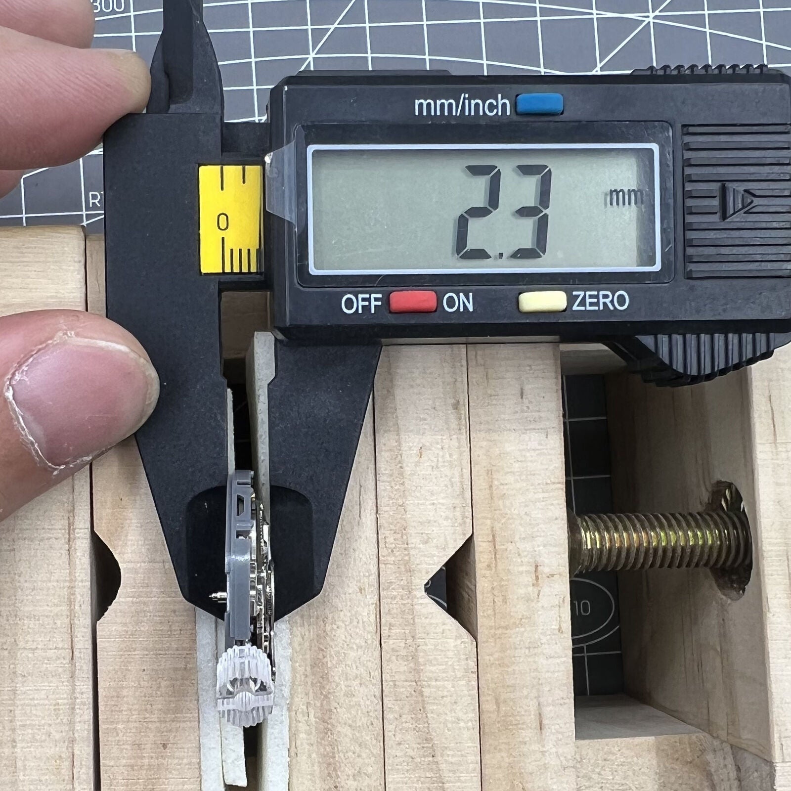 NH36 automatic mechanical watch with black Arabic dial, date display, and angled crown at 3.8 position.