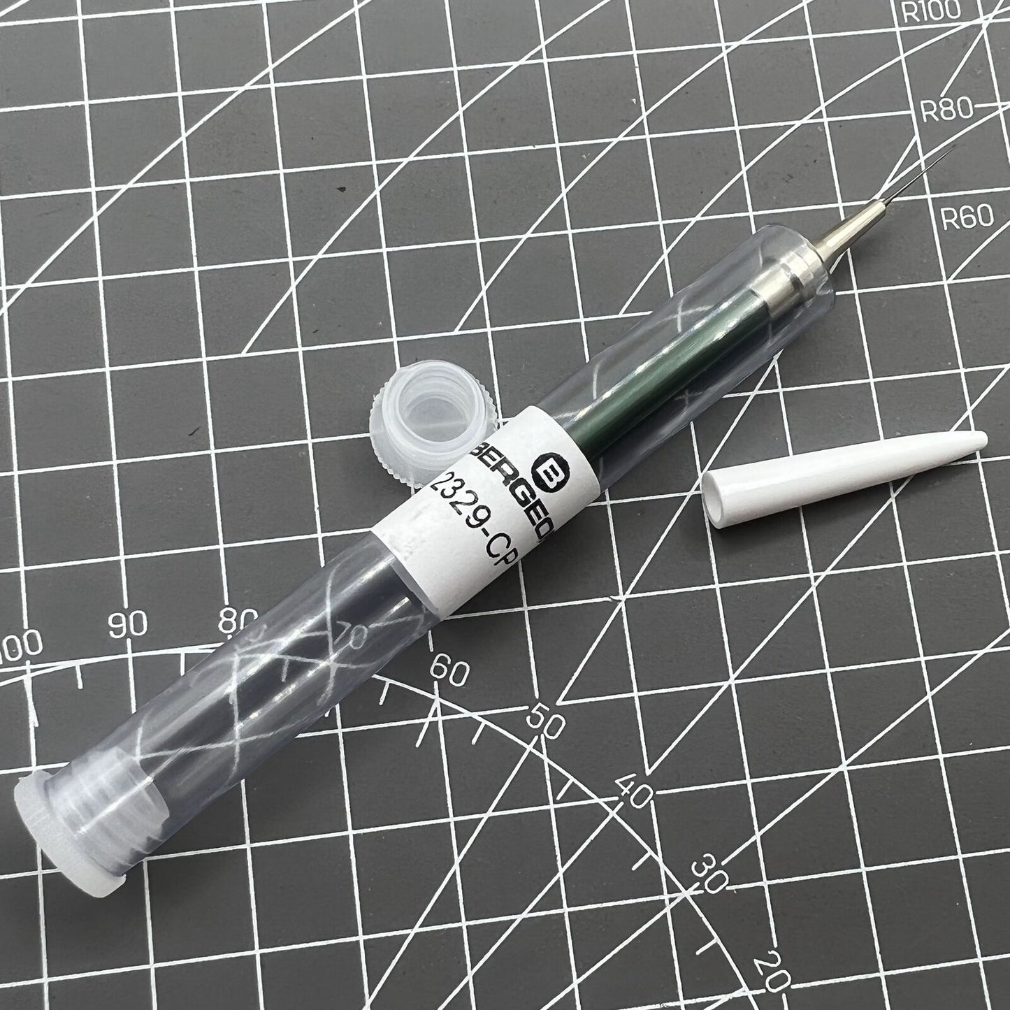 Bergeon 2329-CP watch oiler tool with stand for precise watch maintenance and lubrication.