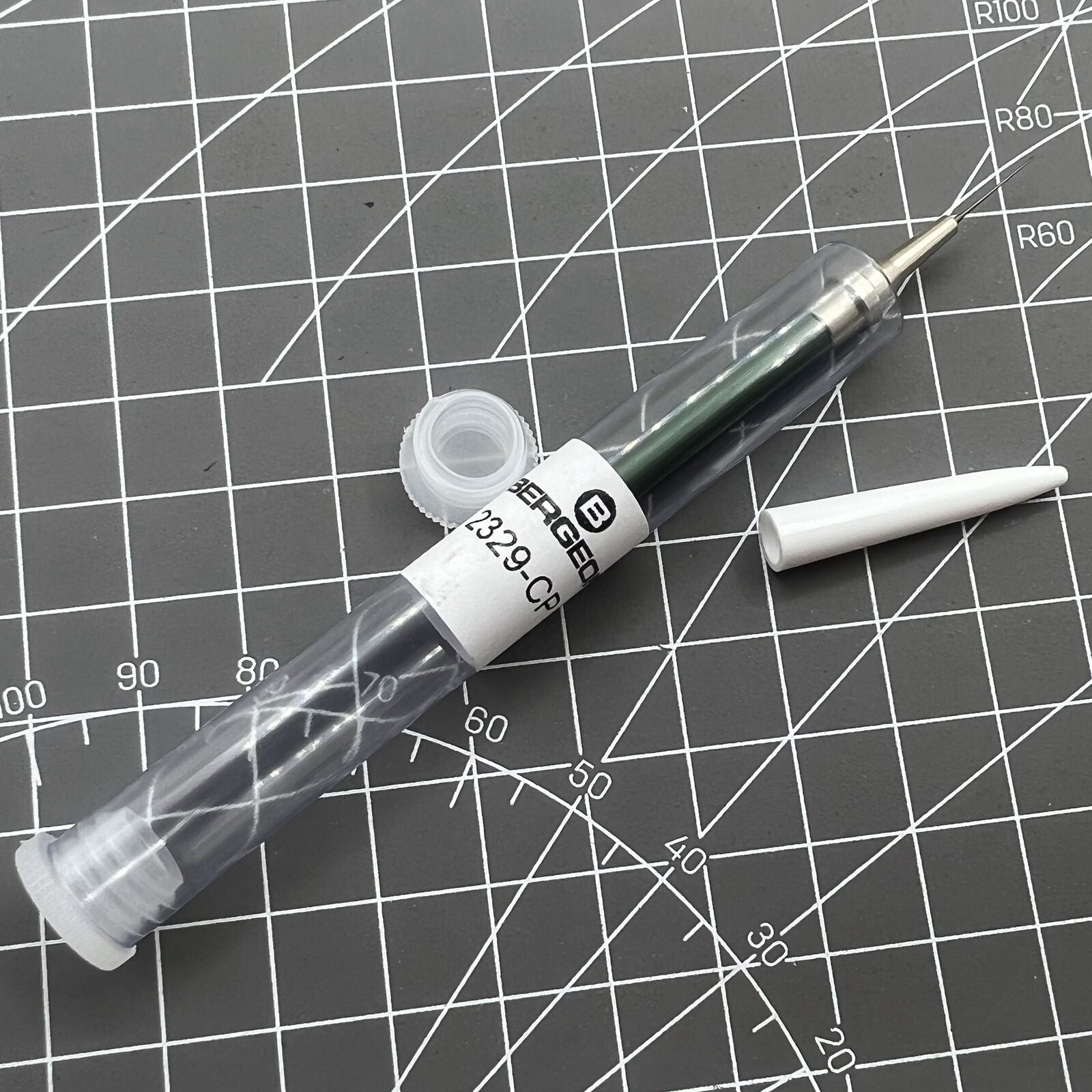 Bergeon 2329-CP watch oiler tool with stand for precise watch maintenance and lubrication.