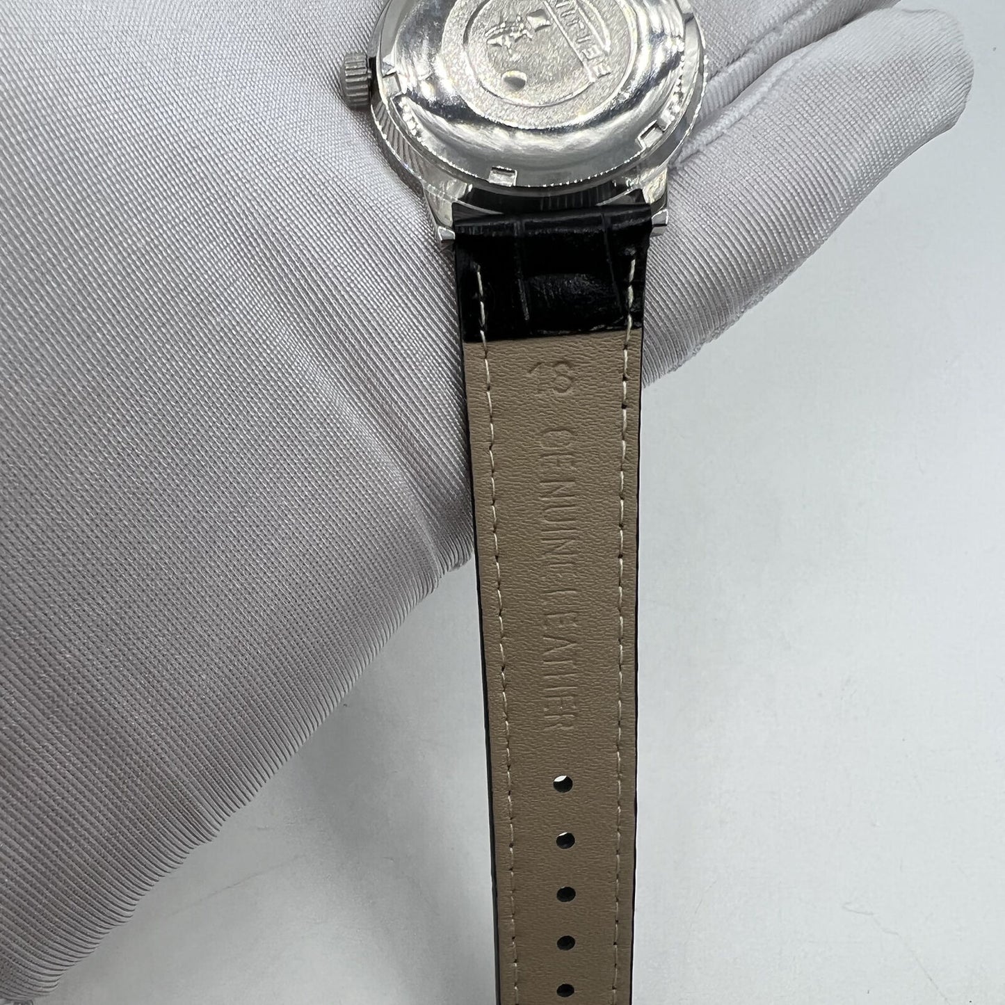 Beijing 36mm Double Rhomb manual watch with silver case and nail strap, classic style for elegant wear.