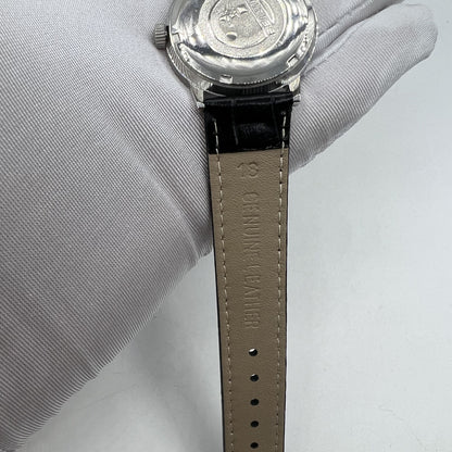 Beijing 36mm Double Rhomb manual watch with silver case and nail strap, classic style for elegant wear.