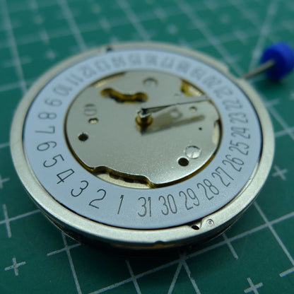 Ronda 5021D Swiss quartz watch movement with date display at 6, ideal for watch accessories.