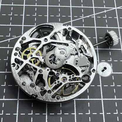 Tianjin Automatikwerk watch mechanism with 24 jewels, hand-engraved silver hollow design for premium watch accessories.