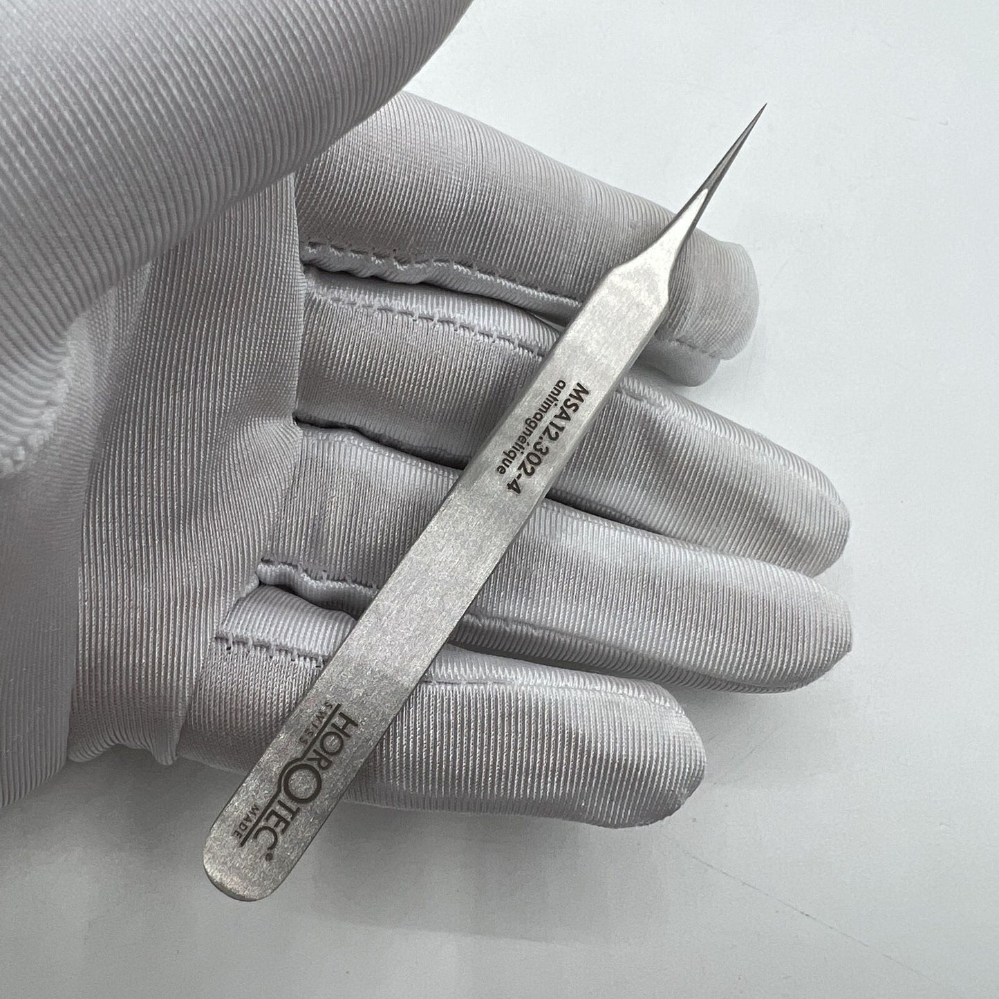 Horotec MSA12.302-4 steel tweezer, Swiss Made, 100% antimagnetic for precise watch accessory handling.