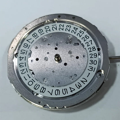 Japan-made Miyota 9130 automatic watch movement with date display at 3, precision timekeeping component.