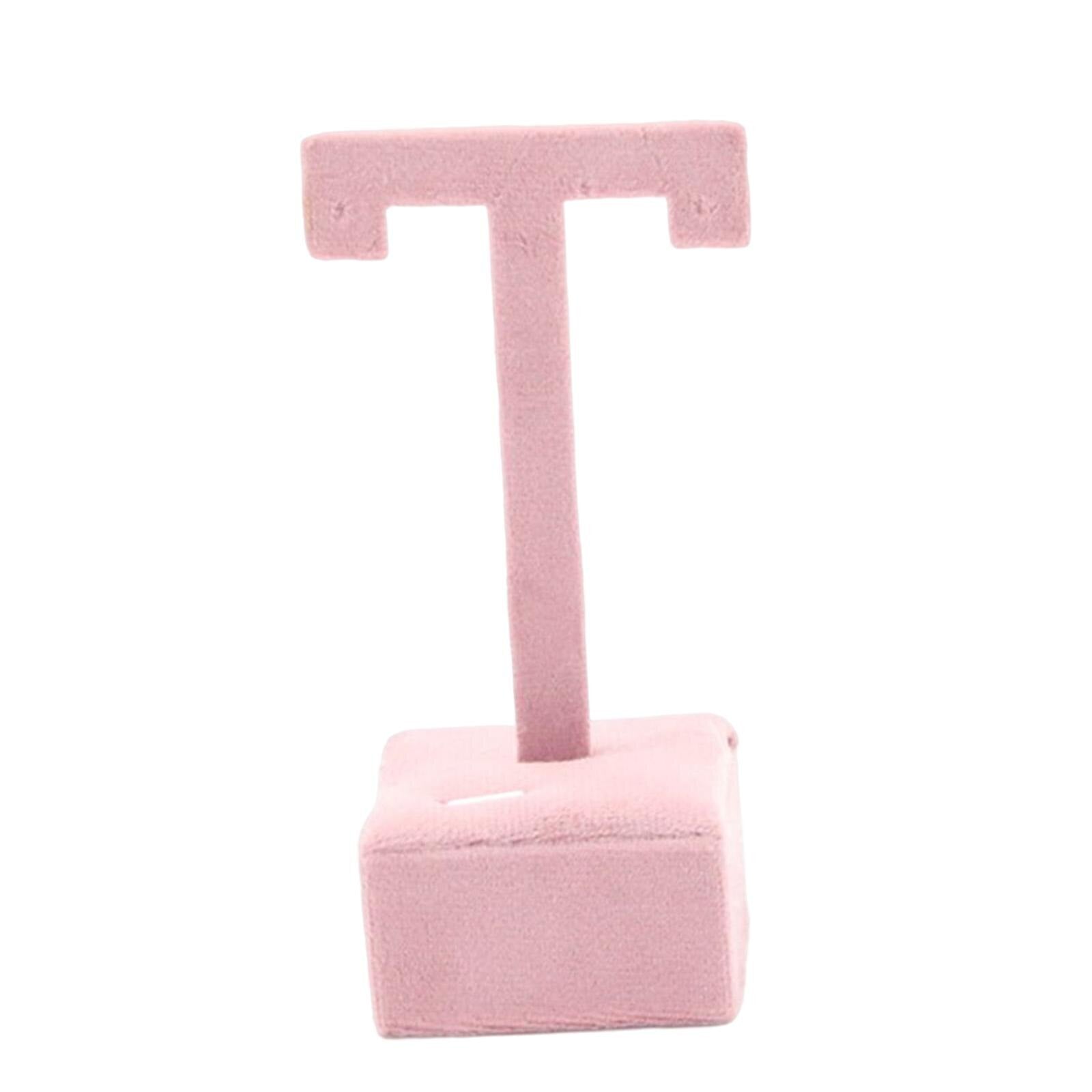 Earring display stand with hanging hooks, decorative jewelry organizer shelf for watch accessories.