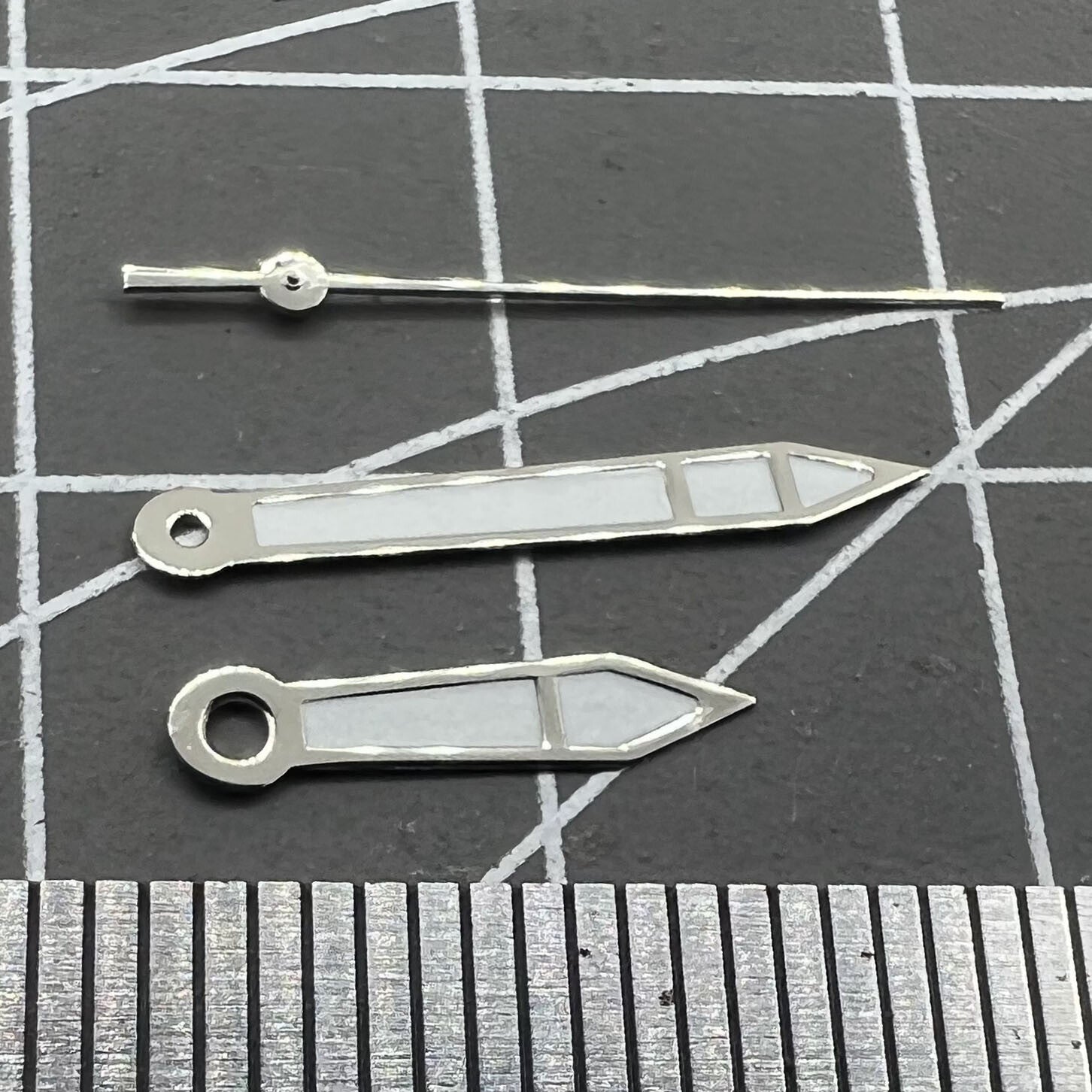Silver 15.7mm watch hands with white paint and silver trim, compatible with Miyota 2315, 2035, 2036, 2115, 2305 movements.