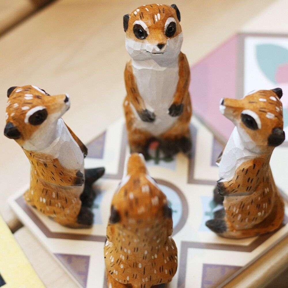 Handmade Meerkat wooden figurine, detailed collectible sculpture perfect for home decor.