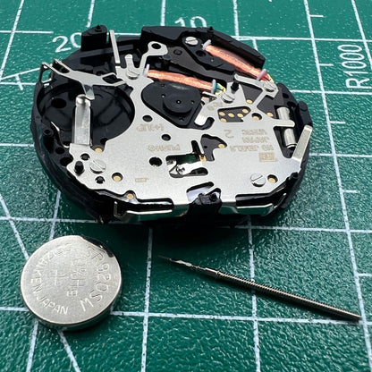 Hattori Epson TMI VD53C quartz watch movement showing date display at 6 o'clock for precise timekeeping.