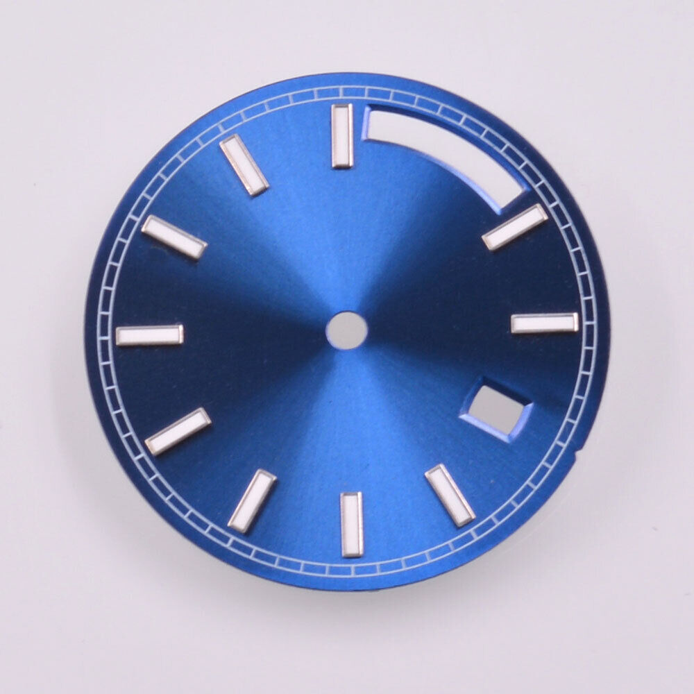 Green lume watch dial with silver trim and blue accents for Seagull ST1644 movement.