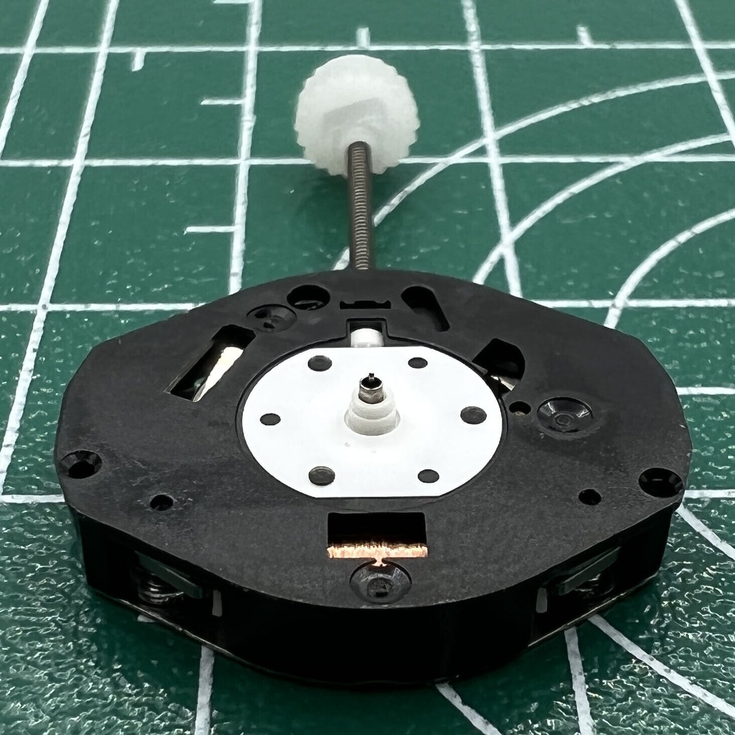 Sunon SL68 Quartz watch movement with 3 hands for precise timekeeping in watch repairs.