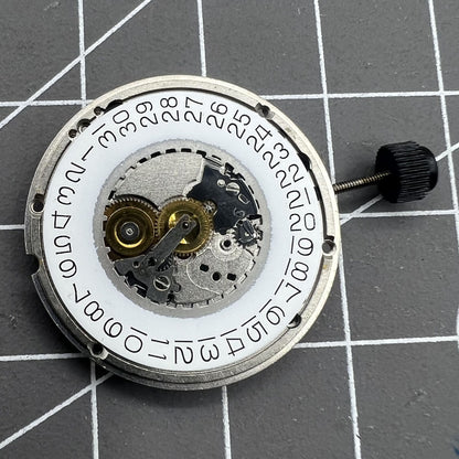 ETA 555.415 quartz watch movement with 3 hands and date at 3 o'clock, vintage original part.