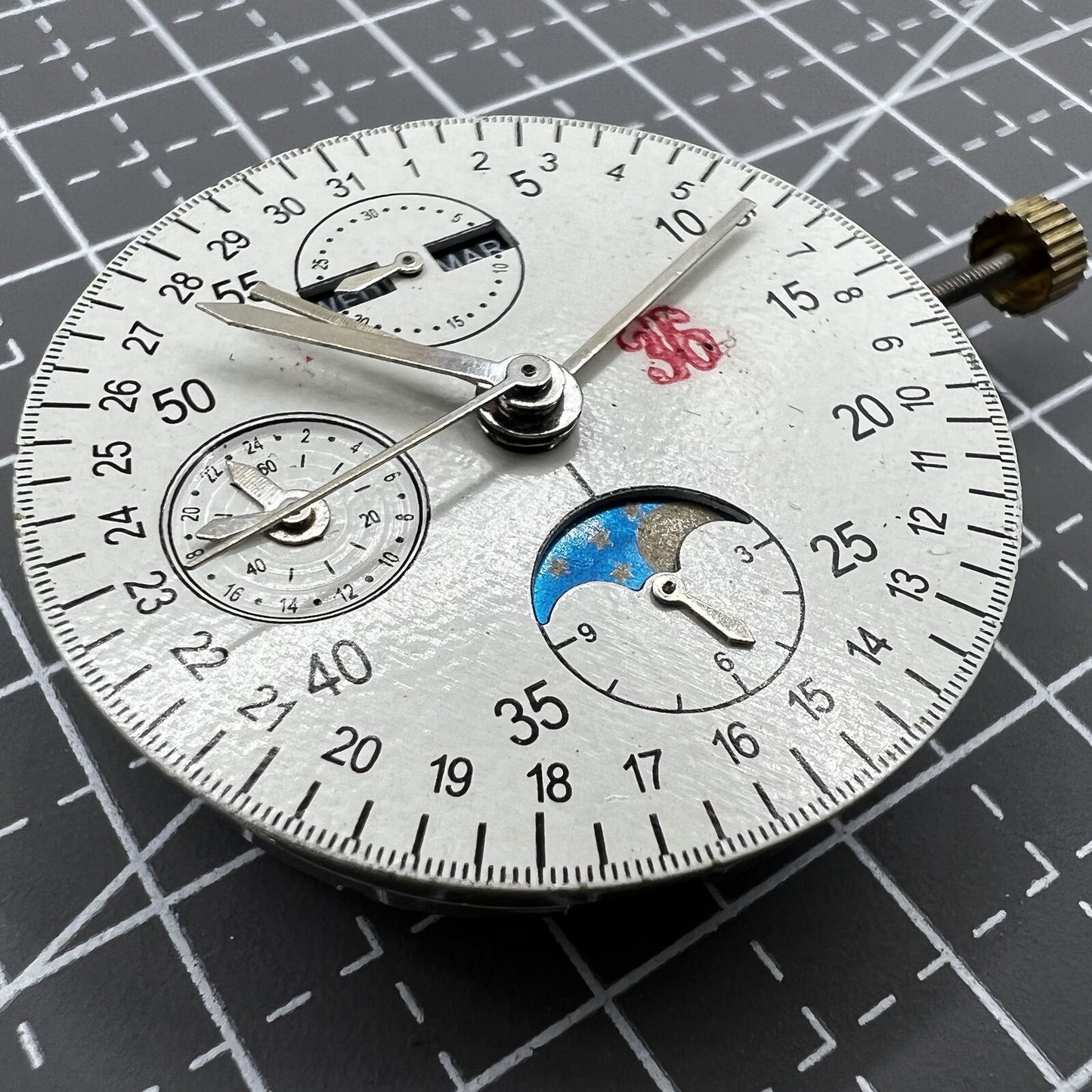 Multifunctional automatic mechanical watch with 8 hands and precise Dandong 7751 movement.