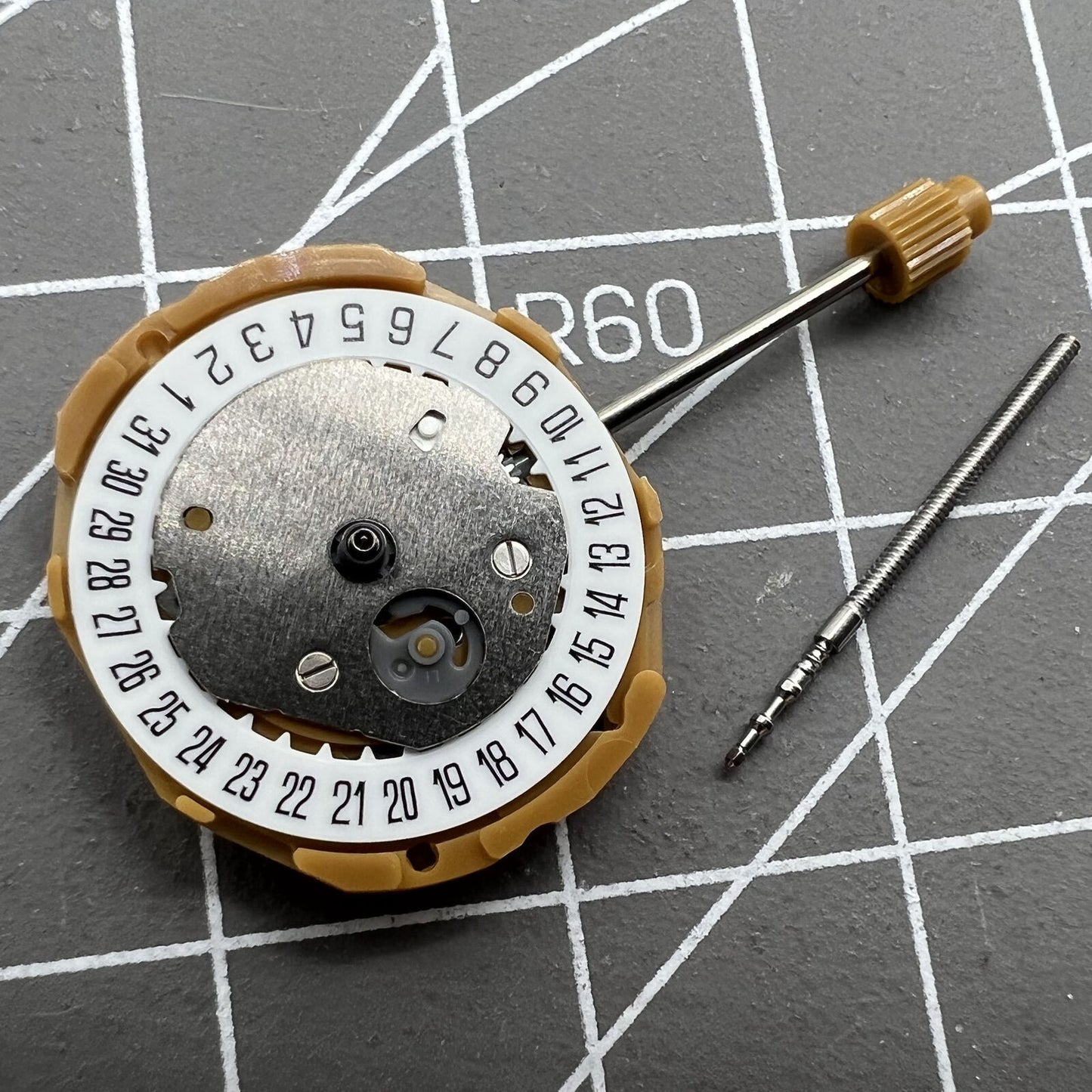 Japan Miyota GL10 quartz watch movement with 3 hands and date display at 6 o'clock, precise and reliable.