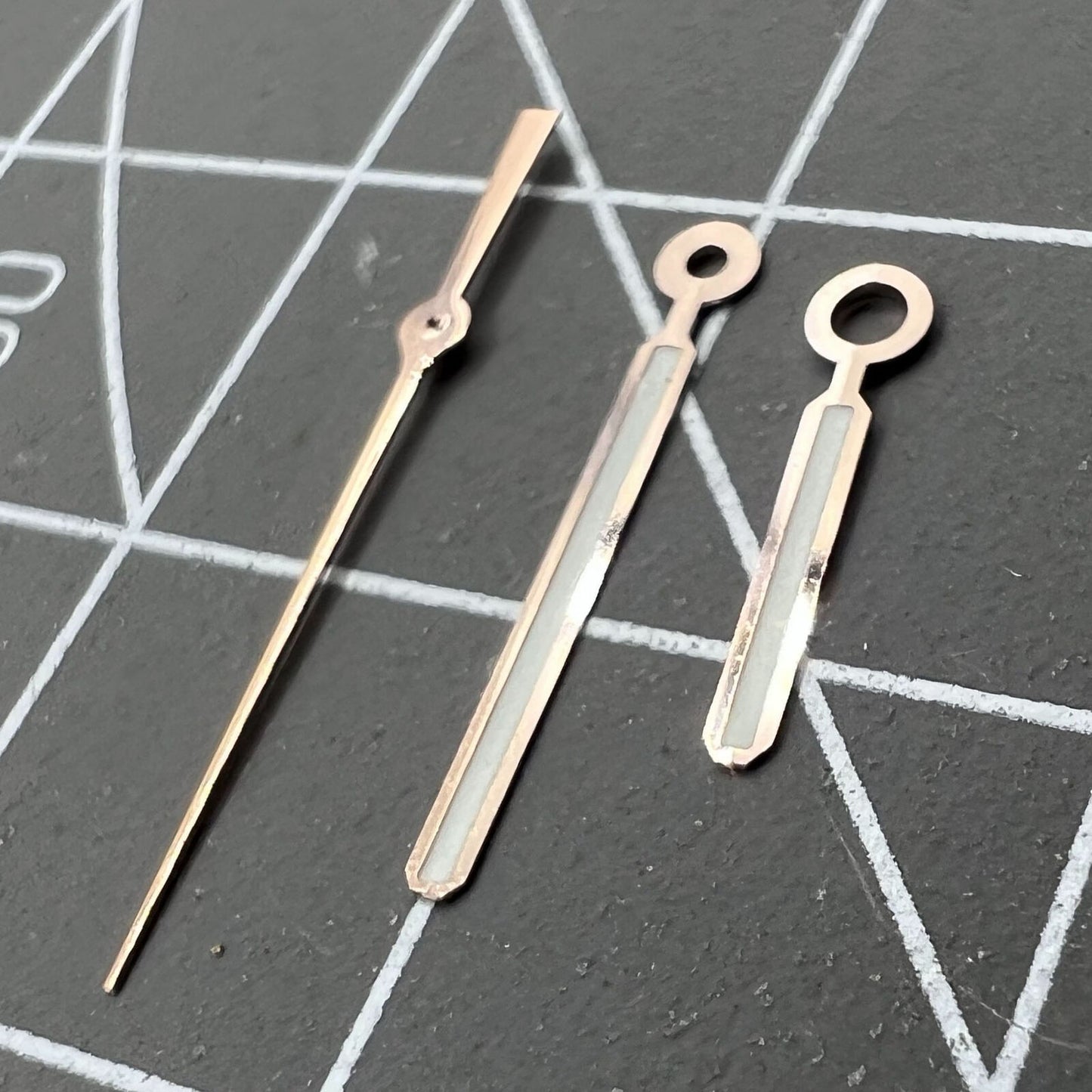 Green luminous rose gold-trimmed AP watch hands for NH35 NH36 SKX007 SBBN models, precise fit and glow.