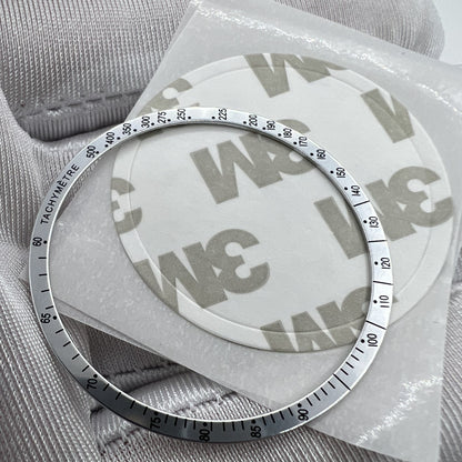 38.5mm aluminum bezel with black font for Omega Speedmaster, enhancing watch durability and style.