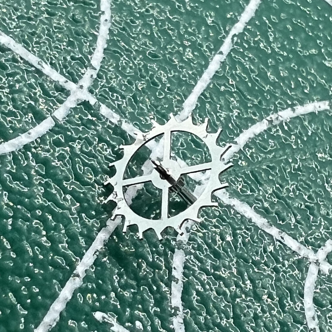 Escape wheel for Dandong 7750 movement, precision watch part for repair and replacement.