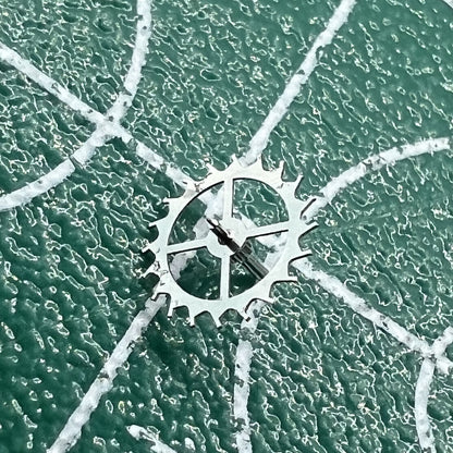 Escape wheel for Dandong 7750 movement, precision watch part for repair and replacement.