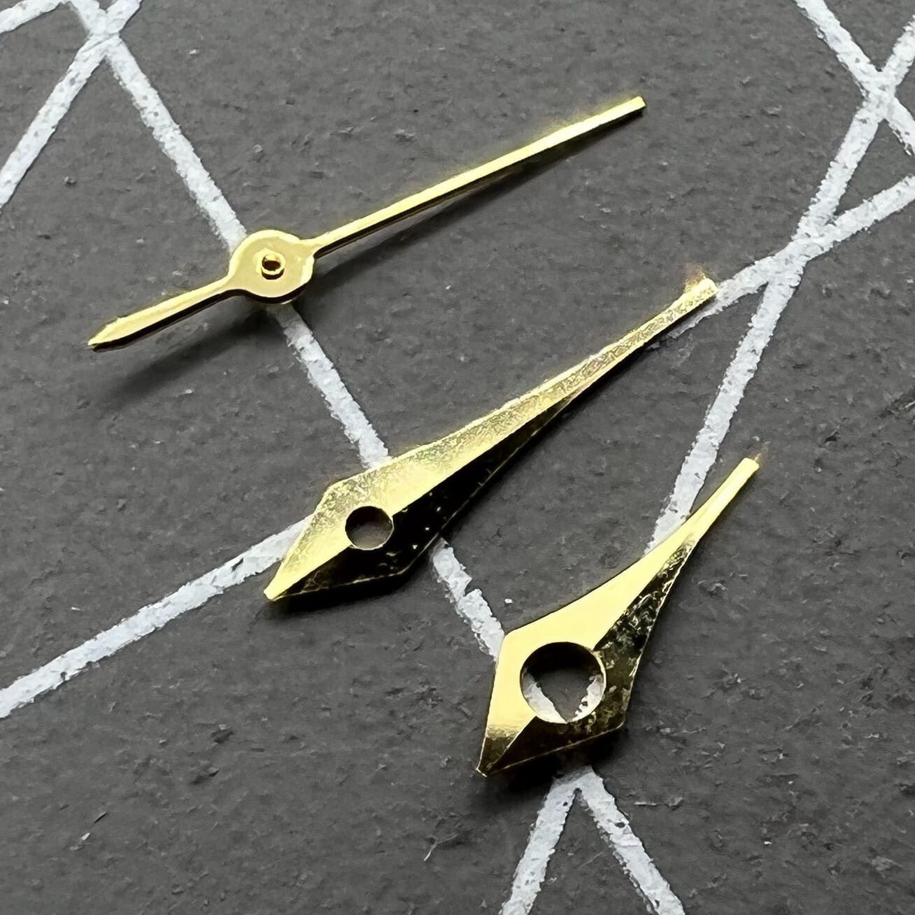 Set of 2 golden 6.5mm pointed trim watch hands for Miyota 2315 and 2035 movements.