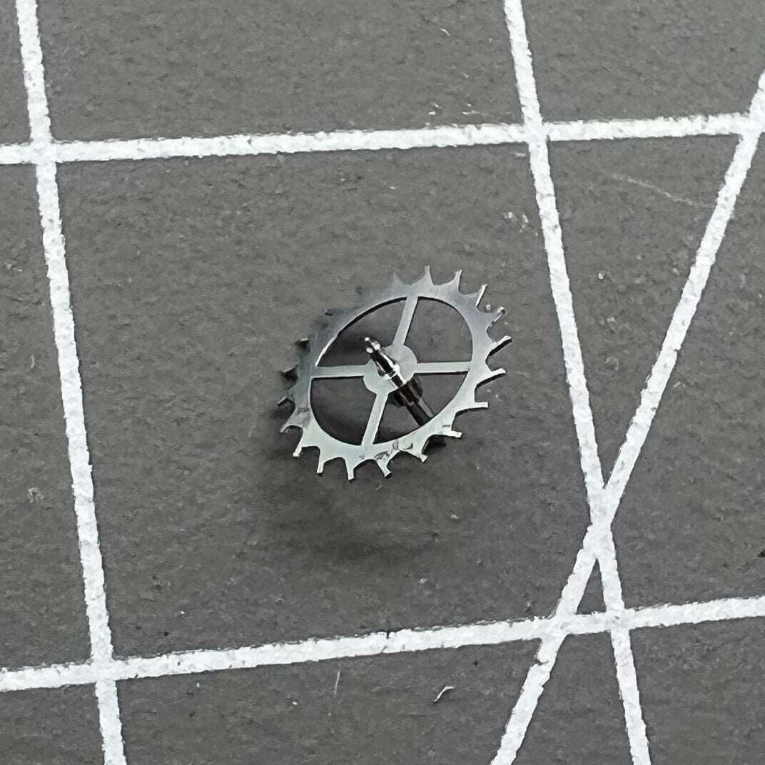 Escape wheel for Dandong 7750 watch movement, precision component ensuring accurate timekeeping performance.