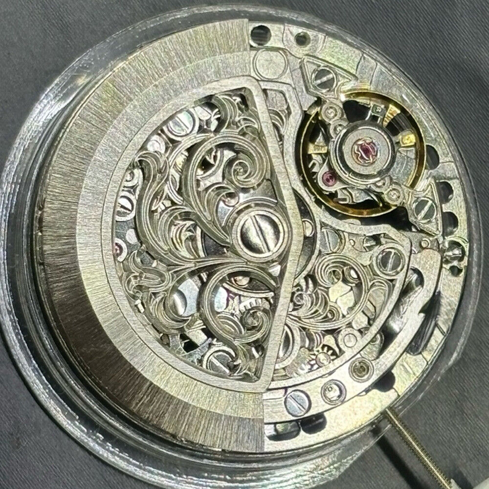 Silver hollow carved watch accessory featuring automatic 7750 mechanical movement for precision timekeeping.
